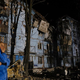 Rusi z raketami napadli stanovanjski kompleks v Zaporožju