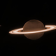 Webb preseneča: temni Saturn z žarečimi prstani