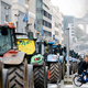 Zasedanje kmetijskih ministrov spremljajo protesti s traktorji