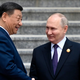 Putin prispel na Kitajsko: srečanje 'starih prijateljev'