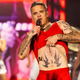 Robbie Williams z novim albumom podrl rekord skupine The Beatles
