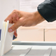 KS 90 proti združevanju referendumov: Interventni zakon si zasluži vso pozornost