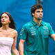 Dirkač formule 1 v razmerju z manekenko iz oglasa z Messijem