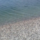 Portoroška plaža v kopalno sezono z novostjo: obalni pas s soškim prodcem