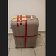 Španka v kovčku tihotapila 15 kilogramov marihuane