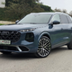 Prestižni SUV z inovativnimi smerniki in dobrimi starimi kljukami na vratih