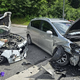Trčenje z motornim kolesom, intervencija zaradi vonja po dimu, dvig nasedlega vozila