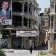 Arabska politična rehabilitacija vojnega zločinca Asada