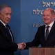 Scholz na obisku pri Netanjahuju pozval k prekinitvi ognja v Gazi