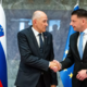 Janševa roka opoziciji: partnerstvo za razvoj ali le iskanje večine?