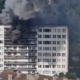 (VIDEO) V desetnadstropni stolpnici v Belgiji izbruhnil požar, več ljudi umrlo