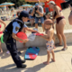 Policisti na portoroški plaži opozarjali na tatvine tujih organiziranih skupin