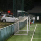 (FOTO) Z avtom prebil dve ograji in skoraj pristal na igrišču med tekmo otrok