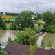 FOTO: Krka tudi v Novem mestu visoka, reka bo še naraščala