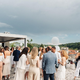 Udeležili smo se prestižne zabave ob bazenu s spektakularnim razgledom nad Ljubljano, kjer so vsi znani obrazi nosili belo (FOTO)