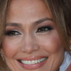 Jennifer Lopez med romantičnim sprehodom z Benom Affleckom v Saint Bartsu nosila oprijeto cvetlično poletno obleko