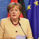 FT: EU v pogajanja s Putinom pošilja Merklovo ali Draghija