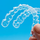 Invisalign v Celju: Diskretna pot do bolj samozavestnega nasmeha