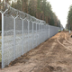 Litva dokončala gradnjo 550 kilometrov dolge ograje na meji z Belorusijo