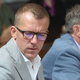 Opeharjeni delavci z detektivom nad Mijiča: dolžan jim je 41 tisočakov