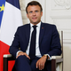 Macron zavrača očitke glede dogovorov s podjetjem Uber