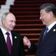 Putin kot glavni gost vrha pobude Pas in cest prispel v Peking