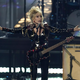 Ko Bon Jovi sreča Queen: Dolly Parton izdala svojo prvo rokovsko skladbo