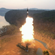 Pjongjang sporočil, da je preizkusil novo nadzvočno raketo na trdo gorivo