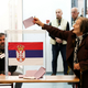 V Srbiji potekajo prelomne predčasne volitve