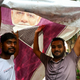 V Delhiju se protivladni protesti kljub spopadom s policijo nadaljujejo