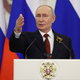 Putin podpisal zakon o uporabi vojske za pomoč Rusom, ki jih pridržijo v tujini