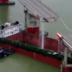 Tovorna ladja zadela in zrušila most: umrli dve osebi, več jih pogrešajo #video