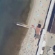 Na tržaški plaži moške in ženske ločuje zid (FOTO)