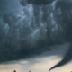 Po vročinskih valovih udarila neurja: pri sosedih poplavilo ceste, v Nemčiji divjal tornado (VIDEO)