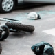 Trk dveh motorjev pri Hraščah: poškodovani obe sopotnici, cesta skoraj uro zaprta