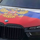 Policisti ustavili BMW z rusko zastavo: 700 evrov kazni za voznika