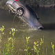 Z BMW-jem končali v pritoku reke Mure (foto)