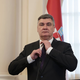 Zaradi grafitov proti Milanoviću mu grozi zapor: "Plačali so mi …"