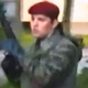 Video: Ko je Stevanovićev gost skakal naokoli z avtomatsko puško